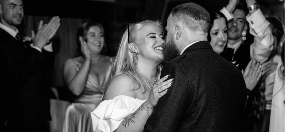 Holly and John sharing a happy moment on the dance floor